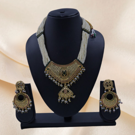 Majestic Pearl-Stranded Brass Necklace with Matching Chandbali Earrings